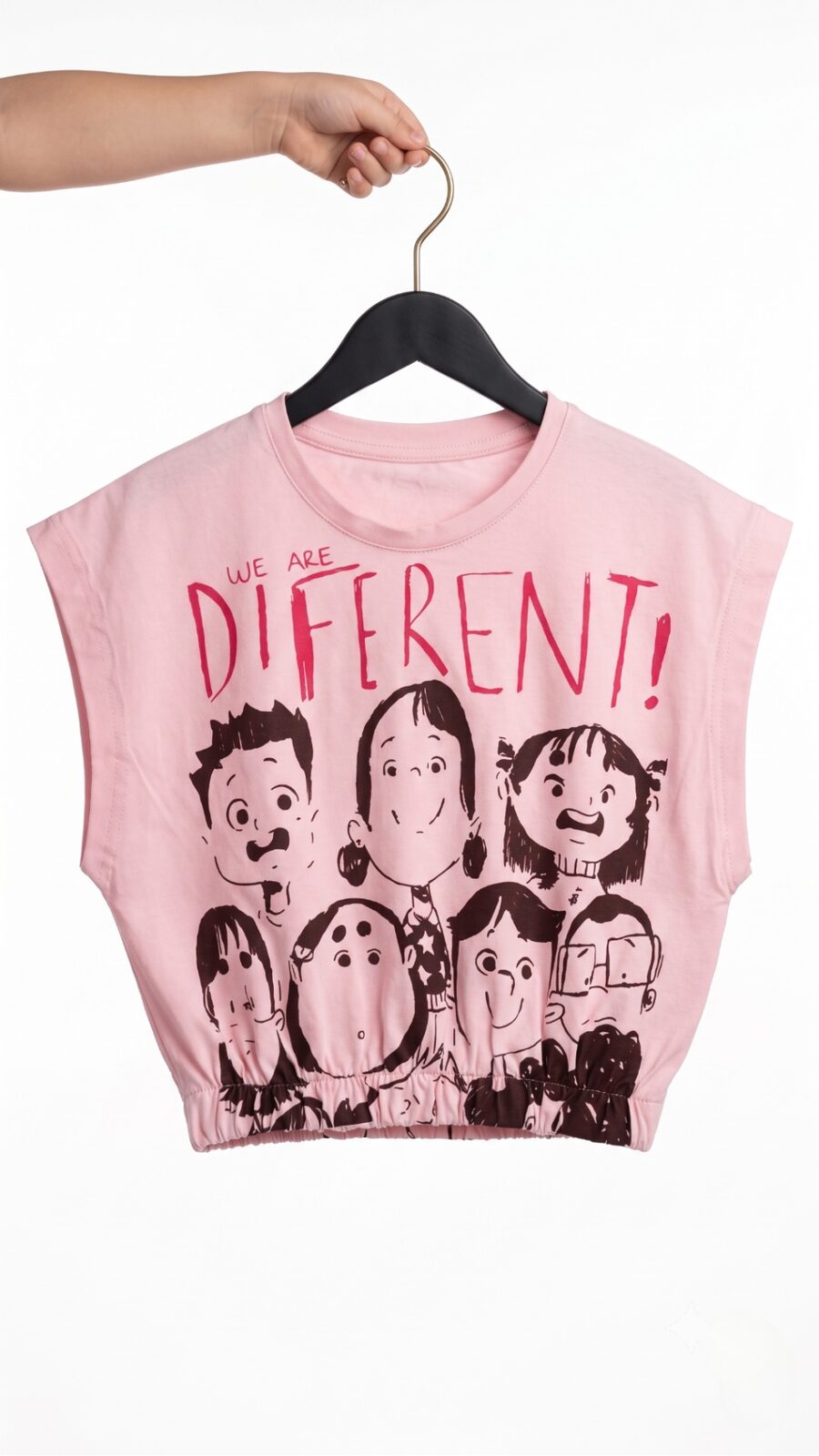Baby pink oversized crop tee — front on hanger