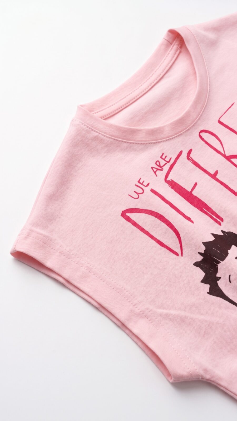 Baby pink tee — fabric and print detail